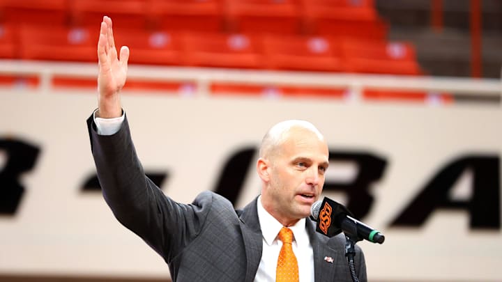 New Oklahoma State University head men's basketball coach Steve Lutz speaks during an introduction