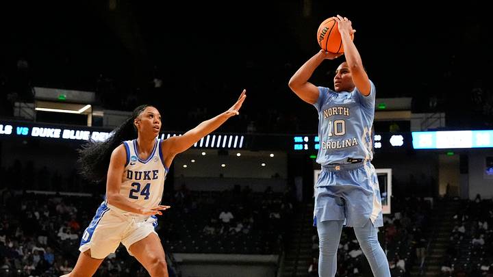Mar 28, 2025; Birmingham, AL, USA; Duke Blue Devils guard Reigan Richardson (24) defends a shot by North Carolina Tar Heels guard Reniya Kelly (10) at Legacy Arena. Mandatory Credit: Gary Cosby Jr.-USA Today Network via Imagn Images Mar 28, 2025; Birmingham, AL, USA; Duke Blue Devils guard Reigan Richardson (24) defends a shot by North Carolina Tar Heels guard Reniya Kelly (10) at Legacy Arena. Mandatory Credit: Gary Cosby Jr.-USA Today Network via Imagn Images