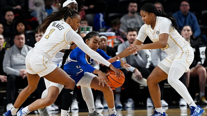 Vanderbilt’s Mikayla Blakes (1) and Iyana Moore (23) battle for the ball with Kentucky forward Teonni Key (7) during an NCAA college basketball game Sunday, Jan. 5, 2025, in Nashville, Tenn.