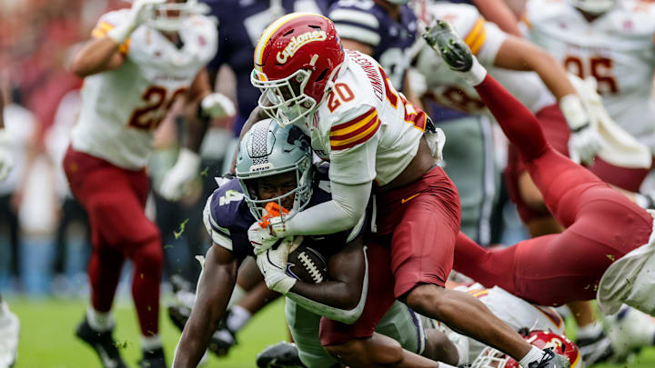 Aug 23, 2025; Dublin, IRELAND; Kansas State player Joe Jackson is tackled by Khijohnn Cummings-Coleman of Iowa State during the Aer Lingus Classic between Iowa State and Kansas State at Aviva Stadium. Mandatory Credit: Laszlo Geczo/INPHO via Imagn Images Aug 23, 2025; Dublin, IRELAND; Kansas State player Joe Jackson is tackled by Khijohnn Cummings-Coleman of Iowa State during the Aer Lingus Classic between Iowa State and Kansas State at Aviva Stadium. Mandatory Credit: Laszlo Geczo/INPHO via Imagn Images