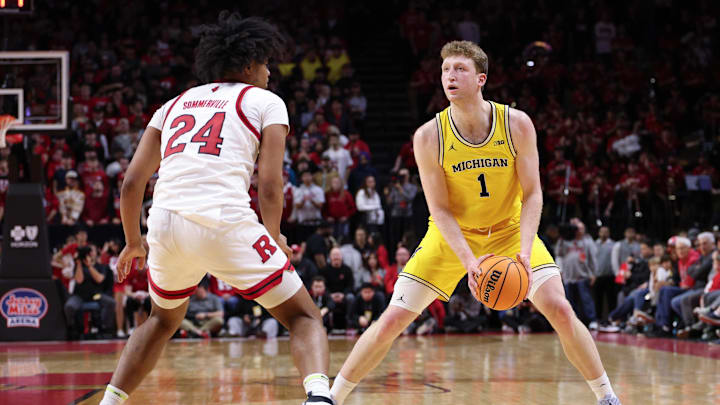 Feb 1, 2025; Piscataway, New Jersey, USA; Michigan Wolverines center Danny Wolf (1) looks to the basket as Rutgers Scarlet Knights center Lathan Sommerville (24) defends during the first half at Jersey Mike's Arena. Mandatory Credit: Vincent Carchietta-Imagn Images Feb 1, 2025; Piscataway, New Jersey, USA; Michigan Wolverines center Danny Wolf (1) looks to the basket as Rutgers Scarlet Knights center Lathan Sommerville (24) defends during the first half at Jersey Mike's Arena. Mandatory Credit: Vincent Carchietta-Imagn Images