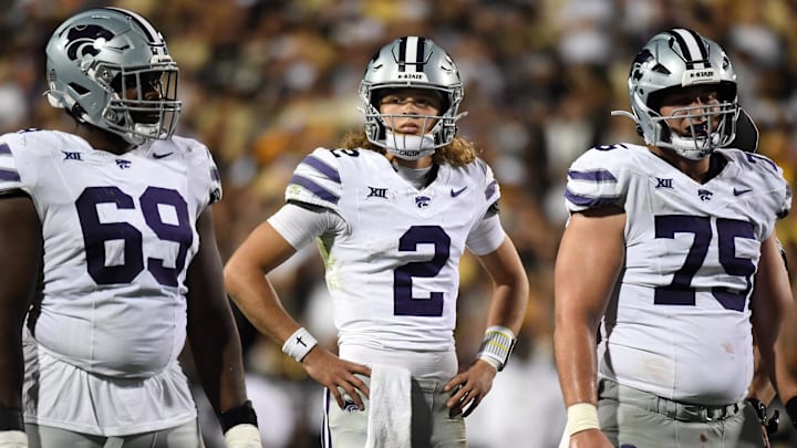 Oct 12, 2024; Boulder, Colorado, USA; Kansas State Wildcats quarterback Avery Johnson (2) waits during a timeout during the first half against the Colorado Buffaloes at Folsom Field. Mandatory Credit: Christopher Hanewinckel-Imagn Images