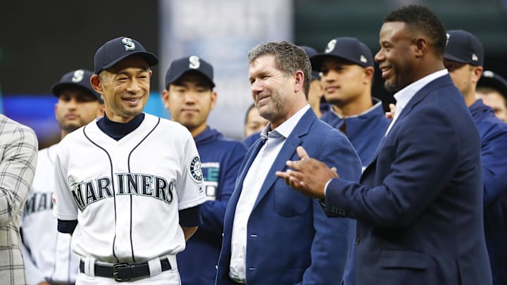 Sep 14, 2019; Seattle, WA, USA; Seattle Mariners former outfielder Ichiro Suzuki, left, reacts with former designated hitter Edgar Martinez, middle, and former outfielder Ken Griffey, Jr., right, at the conclusion of a ceremony honoring Suzuki with the franchise achievement award before a game against the Chicago White Sox at T-Mobile Park. Mandatory Credit: Joe Nicholson-Imagn Images Sep 14, 2019; Seattle, WA, USA; Seattle Mariners former outfielder Ichiro Suzuki, left, reacts with former designated hitter Edgar Martinez, middle, and former outfielder Ken Griffey, Jr., right, at the conclusion of a ceremony honoring Suzuki with the franchise achievement award before a game against the Chicago White Sox at T-Mobile Park. Mandatory Credit: Joe Nicholson-Imagn Images