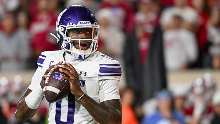 Sep 25, 2026; Bloomington, Indiana, USA; Northwestern Wildcats quarterback Aidan Chiles (0) looks to throw a pass against the Indiana Hoosiers during the second half at Merchants Bank Field at Memorial Stadium. Mandatory Credit: Robert Goddin-Imagn Images Sep 25, 2026; Bloomington, Indiana, USA; Northwestern Wildcats quarterback Aidan Chiles (0) looks to throw a pass against the Indiana Hoosiers during the second half at Merchants Bank Field at Memorial Stadium. Mandatory Credit: Robert Goddin-Imagn Images