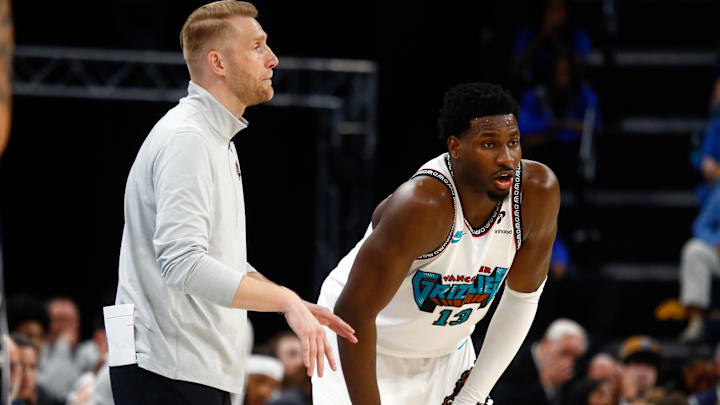 Apr 18, 2025; Memphis, Tennessee, USA; Memphis Grizzlies interim head coach Tuomas Iisalo and forward Jaren Jackson Jr. (13) look on during the fourth quarter against the Dallas Mavericks at FedExForum. Mandatory Credit: Petre Thomas-Imagn Images