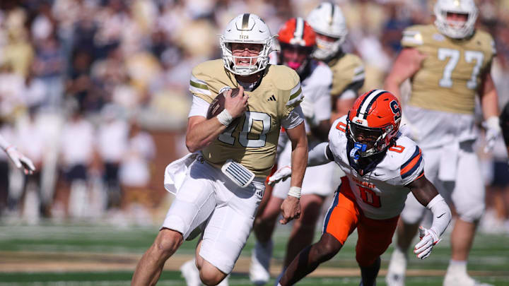 Oct 25, 2025; Atlanta, Georgia, USA; Georgia Tech Yellow Jackets quarterback Haynes King (10) runs the ball against the Syracuse Orange in the fourth quarter at Bobby Dodd Stadium at Hyundai Field. Mandatory Credit: Brett Davis-Imagn Images