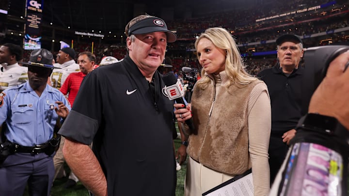 Nov 28, 2025; Atlanta, Georgia, USA; Georgia Bulldogs head coach Kirby Smart talks to reporter Katie George after a victory over the Georgia Tech Yellow Jackets at Mercedes-Benz Stadium. Mandatory Credit: Brett Davis-Imagn Images
Nov 28, 2025; Atlanta, Georgia, USA; Georgia Bulldogs head coach Kirby Smart talks to reporter Katie George after a victory over the Georgia Tech Yellow Jackets at Mercedes-Benz Stadium. Mandatory Credit: Brett Davis-Imagn Images