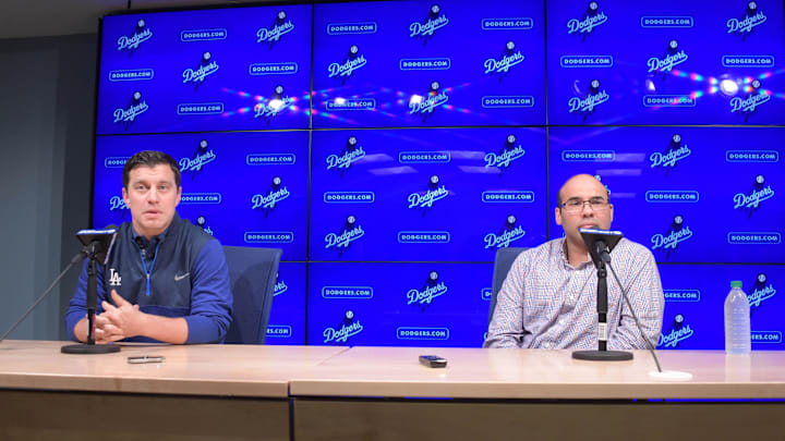 Nov 7, 2017; Los Angeles, CA, USA; Los Angeles Dodger president of baseball operations Andrew Friedman (left) and general manager Farhan Zaidi address the media at a press conference at Dodger Stadium. Mandatory Credit: Kirby Lee-Imagn Images