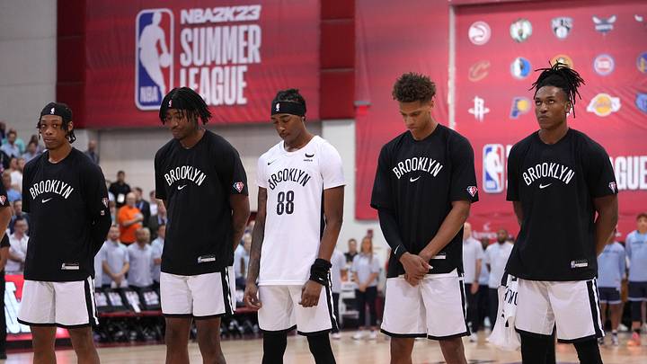 Jul 12, 2022; Las Vegas, NV, USA; Brooklyn Nets players look on during the playing of the national anthem before an NBA Summer League game against the Memphis Grizzlies at Cox Pavilion. Mandatory Credit: Stephen R. Sylvanie-Imagn Images