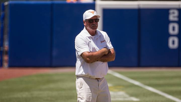 Texas Longhorns head coach Mike White looks on in the second inning against the Tennessee Lady Volunteers.