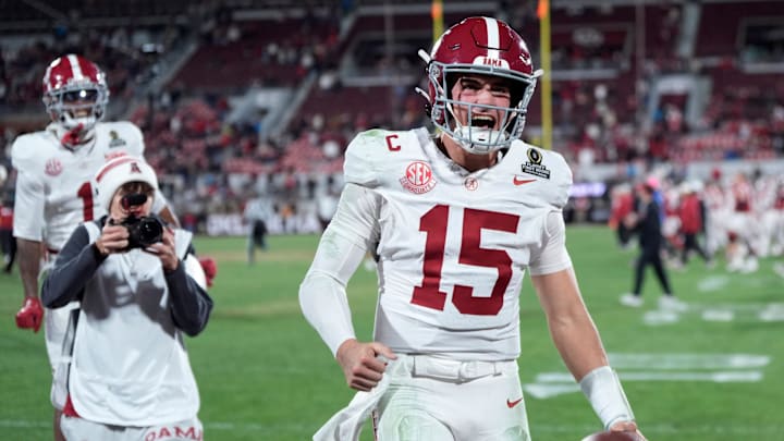 Alabama's Ty Simpson (15) celebrates following the College Football Playoff game between the University of Oklahoma Sooners (OU) and the Alabama Crimson Tide at the Gaylord Family – Oklahoma Memorial Stadium in Norman, Okla., Friday Dec. 19, 2025.