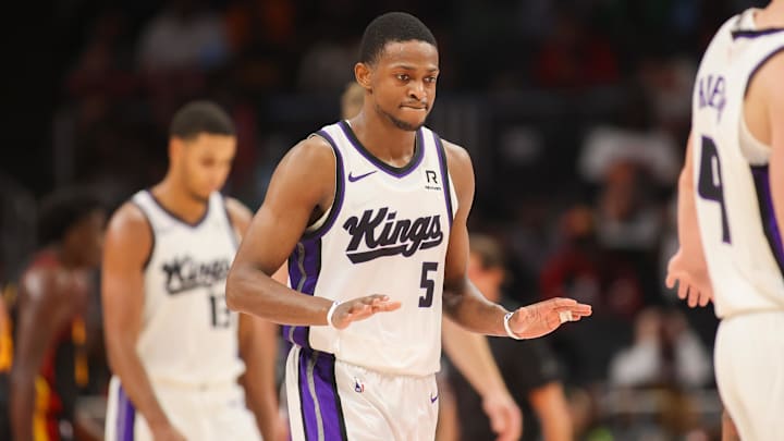 Nov 1, 2024; Atlanta, Georgia, USA; Sacramento Kings guard De'Aaron Fox (5) reacts after a basket against the Atlanta Hawks in the fourth quarter at State Farm Arena. Mandatory Credit: Brett Davis-Imagn Images