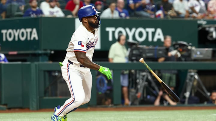Aug 26, 2025; Arlington, Texas, USA; Texas Rangers right fielder Adolis Garcia (53) hits an rbi double during the first inning against the Los Angeles Angels at Globe Life Field. Mandatory Credit: Kevin Jairaj-Imagn Images
