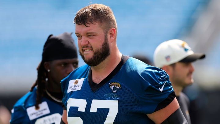 Jacksonville Jaguars offensive tackle Chandler Brewer (67) walks off the field after the third and final day of a mandatory minicamp Monday, June 12, 2023 at TIAA Bank Field in Jacksonville, Fla.
