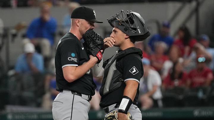 Jul 20, 2026; Arlington, Texas, USA;  Chicago White Sox pitcher Sean Newcomb (15) is visited on the mound by. catcher Drew Romo (36) against the Texas Rangers during the eighth inning at Globe Life Field. Mandatory Credit: Raymond Carlin III-Imagn Images