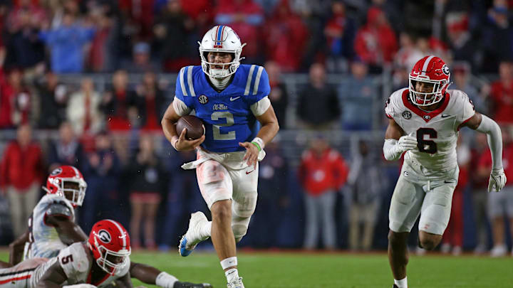 Nov 9, 2024; Oxford, Mississippi, USA; Mississippi Rebels quarterback Jaxson Dart (2) runs the ball during the second half against the Georgia Bulldogs at Vaught-Hemingway Stadium. Mandatory Credit: Petre Thomas-Imagn Images Nov 9, 2024; Oxford, Mississippi, USA; Mississippi Rebels quarterback Jaxson Dart (2) runs the ball during the second half against the Georgia Bulldogs at Vaught-Hemingway Stadium. Mandatory Credit: Petre Thomas-Imagn Images