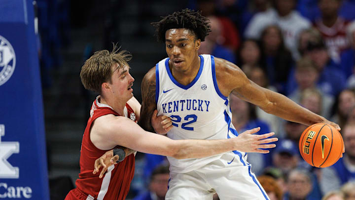 Jan 18, 2025; Lexington, Kentucky, USA; Kentucky Wildcats center Amari Williams (22) handles the ball against Alabama Crimson Tide forward Grant Nelson (4) during the first half at Rupp Arena at Central Bank Center. Mandatory Credit: Jordan Prather-Imagn Images