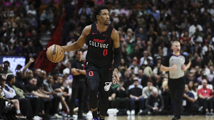 Jan 25, 2024; Miami, Florida, USA; Miami Heat guard Josh Richardson (0) dribbles the basketball against the Boston Celtics during the third quarter at Kaseya Center. Mandatory Credit: Sam Navarro-Imagn Images