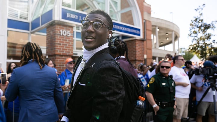 Florida Gators linebacker Chief Borders (14) smiles at a fan during Gator Walk at Steve Spurrier Field at Ben Hill Griffin Stadium in Gainesville, FL on Saturday, November 12, 2022. [Matt Pendleton/Gainesville Sun]

Ncaa Football Florida Gators Vs South Carolina Gamecocks

Syndication Gator Sports