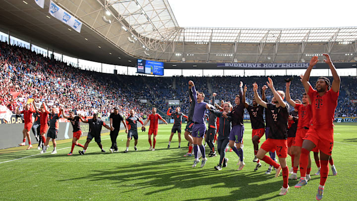Bayern Munich players celebrating with fans after beating Hoffenheim on Saturday.