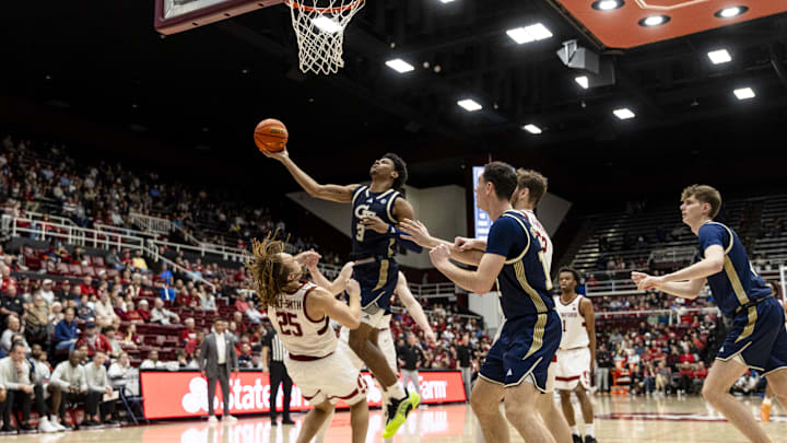Feb 7, 2026; Stanford, California, USA;  Georgia Tech Yellow Jackets guard Jaeden Mustaf (3) shoots while colliding with Stanford Cardinal guard Jeremy Dent-Smith (25) during the second half at Maples Pavilion. Mandatory Credit: John Hefti-Imagn Images