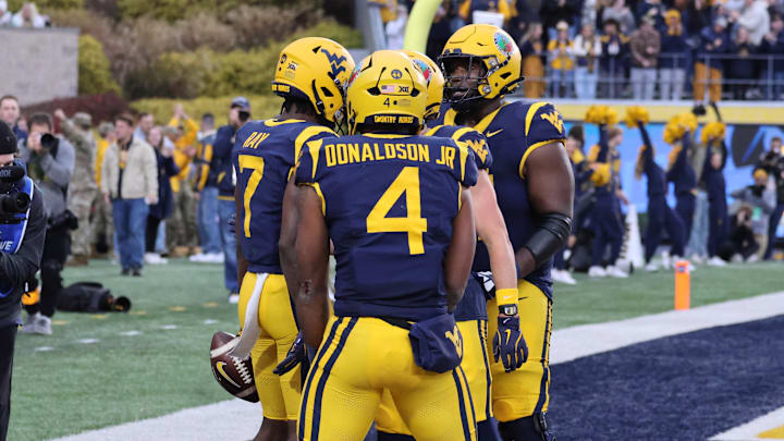 West Virginia University football vs. Baylor. West Virginia University football vs. Baylor.