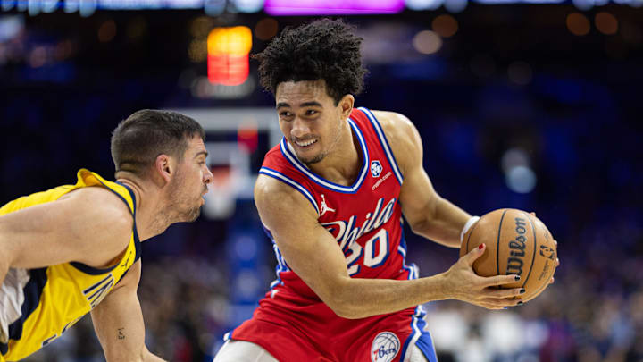 Dec 13, 2024; Philadelphia, Pennsylvania, USA; Philadelphia 76ers guard Jared McCain (20) and Indiana Pacers guard T.J. McConnell (9) in action at Wells Fargo Center. Mandatory Credit: Bill Streicher-Imagn Images