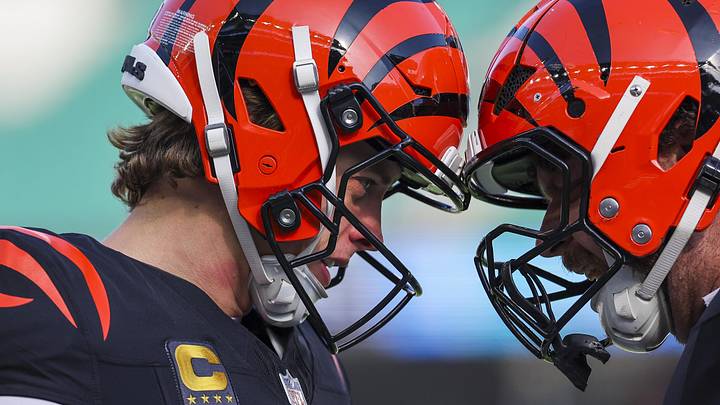 Jan 4, 2026; Cincinnati, Ohio, USA; Cincinnati Bengals quarterback Joe Burrow (9) and center Ted Karras (64) bump helmets during pregame warmups against the Cleveland Browns at Paycor Stadium. Mandatory Credit: Joseph Maiorana-Imagn Images Jan 4, 2026; Cincinnati, Ohio, USA; Cincinnati Bengals quarterback Joe Burrow (9) and center Ted Karras (64) bump helmets during pregame warmups against the Cleveland Browns at Paycor Stadium. Mandatory Credit: Joseph Maiorana-Imagn Images