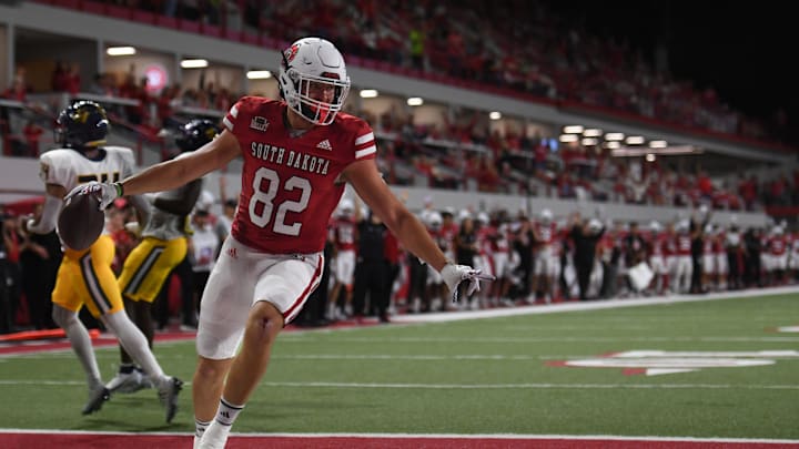 USD's JJ Galbreath (82) scores a touchdown at the first quarter during a game against the Murray State Racers on Saturday, Oct. 7, 2023 at Dakota Dome in Vermillion, South Dakota. USD's JJ Galbreath (82) scores a touchdown at the first quarter during a game against the Murray State Racers on Saturday, Oct. 7, 2023 at Dakota Dome in Vermillion, South Dakota.