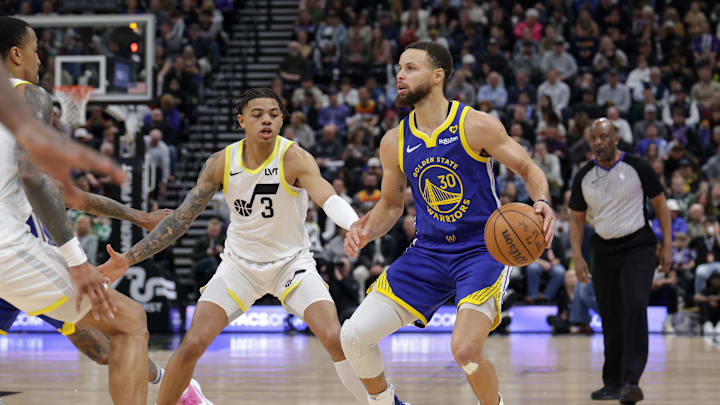 Feb 15, 2024; Salt Lake City, Utah, USA; Golden State Warriors guard Stephen Curry (30) controls the ball during the second half against the Utah Jazz at Delta Center. Mandatory Credit: Chris Nicoll-Imagn Images