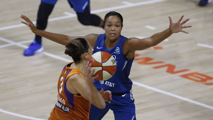 Sep 17, 2020; Bradenton, Florida, USA; Minnesota Lynx forward Napheesa Collier (24) guards against Phoenix Mercury guard Diana Taurasi (3) during the first half at the FELD Entertainment complex. Mandatory Credit: Reinhold Matay-Imagn Images