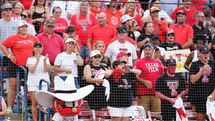 Texas Tech fans cheer at the 2025 Women's College World Series. Texas Tech fans cheer at the 2025 Women's College World Series.