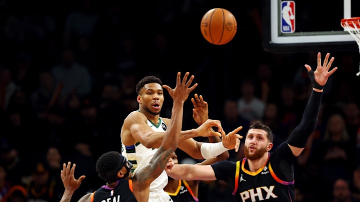 Feb 6, 2024; Phoenix, Arizona, USA; Milwaukee Bucks forward Giannis Antetokounmpo (34) passes the ball against Phoenix Suns guard Bradley Beal (3) and center Jusuf Nurkic (20) during the third quarter at Footprint Center. Mandatory Credit: Mark J. Rebilas-Imagn Images Feb 6, 2024; Phoenix, Arizona, USA; Milwaukee Bucks forward Giannis Antetokounmpo (34) passes the ball against Phoenix Suns guard Bradley Beal (3) and center Jusuf Nurkic (20) during the third quarter at Footprint Center. Mandatory Credit: Mark J. Rebilas-Imagn Images