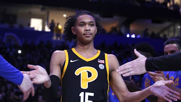 Jan 28, 2025; Pittsburgh, Pennsylvania, USA;  Pittsburgh Panthers guard Jaland Lowe (15) takes the court during player introductions against the North Carolina Tar Heels at the Petersen Events Center. Mandatory Credit: Charles LeClaire-Imagn Images