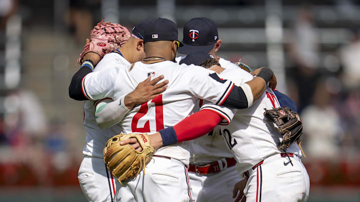 Sep 15, 2024; Minneapolis, Minnesota, USA; Minnesota Twins players huddle on the field after defeating the Cincinnati Reds at Target Field. Mandatory Credit: Jesse Johnson-Imagn Images