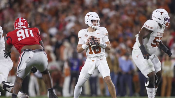 Texas Longhorns quarterback Arch Manning (16) looks to make a pass in the first half against the Georgia Bulldogs.