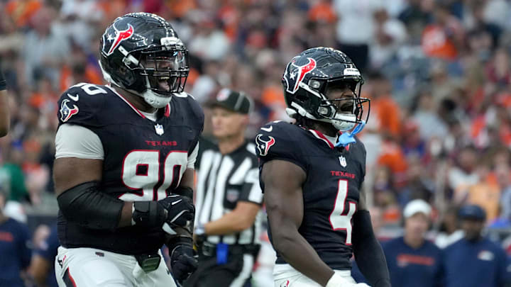 Nov 2, 2025; Houston, Texas, USA; Houston Texans defensive tackle Sheldon Rankins (90) and cornerback Kamari Lassiter (4) celebrate after a play during the second half against the Denver Broncos at NRG Stadium. Mandatory Credit: Sean Thomas-Imagn Images Nov 2, 2025; Houston, Texas, USA; Houston Texans defensive tackle Sheldon Rankins (90) and cornerback Kamari Lassiter (4) celebrate after a play during the second half against the Denver Broncos at NRG Stadium. Mandatory Credit: Sean Thomas-Imagn Images