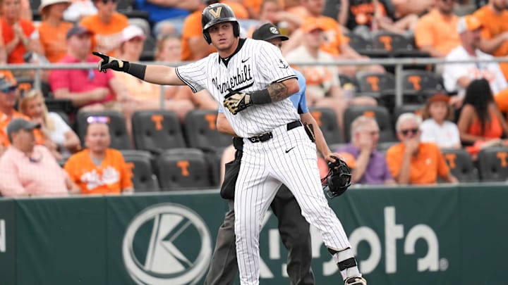 Vanderbilt infielder Braden Holcomb (26) gestures to the Vanderbilt dugout after hitting a triple during a NCAA baseball game between the Tennessee Volunteers and Vanderbilt Commodores at Lindsey Nelson Stadium on May 11, 2025.
