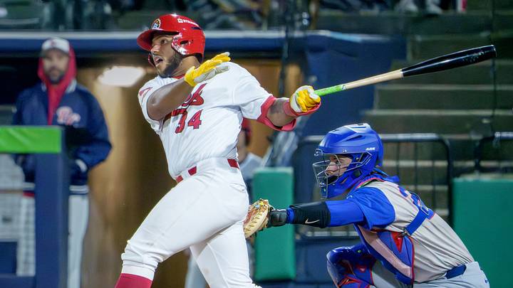Peoria catcher Rainiel Rodriguez watches his hit leave the infield for a base hit against South Bend during the Chiefs' home opener Tuesday, April 7, 2026 at Dozer Park. The Chiefs routed the Cubs 10-1. Peoria catcher Rainiel Rodriguez watches his hit leave the infield for a base hit against South Bend during the Chiefs' home opener Tuesday, April 7, 2026 at Dozer Park. The Chiefs routed the Cubs 10-1.