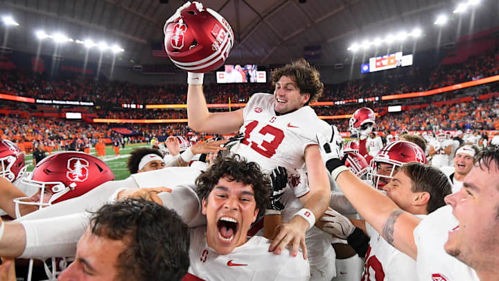 Sep 20, 2024; Syracuse, New York, USA; Stanford Cardinal place kicker Emmet Kenney (13) is carried by teammates following his game winning field goal against the Syracuse Orange at the JMA Wireless Dome. Mandatory Credit: Rich Barnes-Imagn Images Sep 20, 2024; Syracuse, New York, USA; Stanford Cardinal place kicker Emmet Kenney (13) is carried by teammates following his game winning field goal against the Syracuse Orange at the JMA Wireless Dome. Mandatory Credit: Rich Barnes-Imagn Images