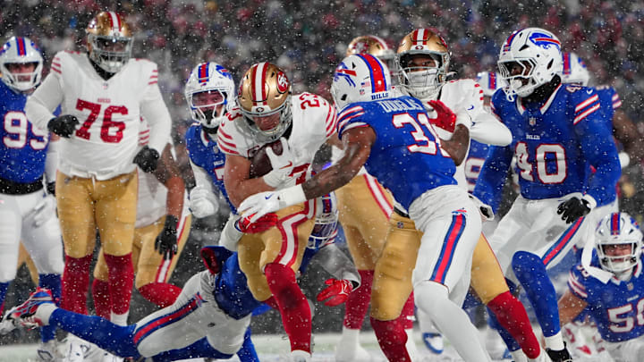 Dec 1, 2024; Orchard Park, New York, USA; Buffalo Bills cornerback Rasul Douglas (31) tackles San Francisco 49ers running back Christian McCaffrey (23) during the first half at Highmark Stadium.s