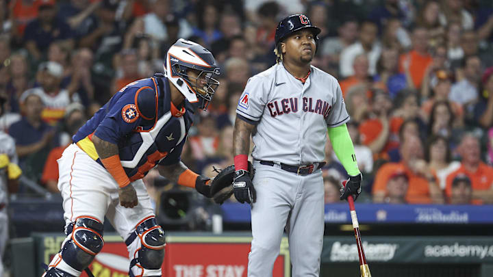 Aug 1, 2023; Houston, Texas, USA; Houston Astros catcher Martin Maldonado (15) applies a tag to Cleveland Guardians third baseman Jose Ramirez (11) after a strikeout during the fourth inning at Minute Maid Park. Mandatory Credit: Troy Taormina-Imagn Images