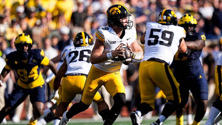 Iowa quarterback Hank Brown (9) looks to pass against Michigan during the first half at Michigan Stadium in Ann Arbor on Saturday, Sept. 26, 2026.
