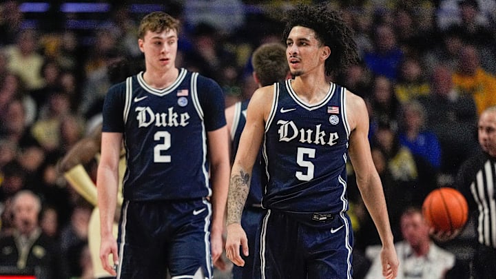 Jan 25, 2025; Winston-Salem, North Carolina, USA; Duke basketball guard Cooper Flagg (2) and guard Tyrese Proctor (5) against the Wake Forest Demon Deacons at Lawrence Joel Veterans Memorial Coliseum.