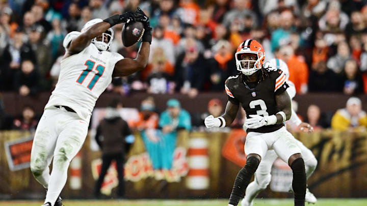 Cleveland Browns wide receiver Jerry Jeudy (3) watches as Miami Dolphins linebacker Tyrel Dodson (11) intercepts the pass during the first half at Huntington Bank Field. Cleveland Browns wide receiver Jerry Jeudy (3) watches as Miami Dolphins linebacker Tyrel Dodson (11) intercepts the pass during the first half at Huntington Bank Field.
