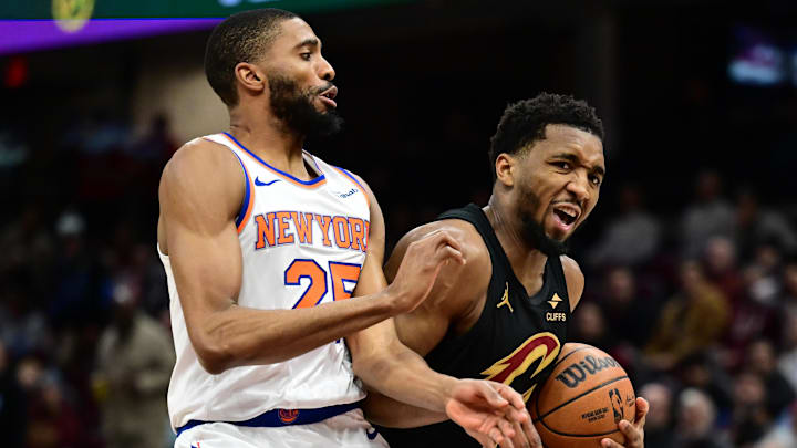 Feb 21, 2025; Cleveland, Ohio, USA; Cleveland Cavaliers guard Donovan Mitchell (45) drives to the basket against New York Knicks forward Mikal Bridges (25) during the second half at Rocket Arena. Mandatory Credit: Ken Blaze-Imagn Images Feb 21, 2025; Cleveland, Ohio, USA; Cleveland Cavaliers guard Donovan Mitchell (45) drives to the basket against New York Knicks forward Mikal Bridges (25) during the second half at Rocket Arena. Mandatory Credit: Ken Blaze-Imagn Images