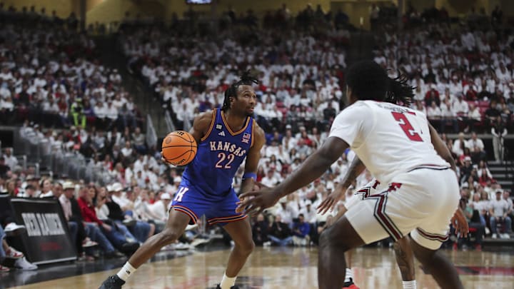 Feb 2, 2026; Lubbock, Texas, USA;  Kansas Jayhawks guard Darryn Peterson (22) dribbles the ball against Texas Tech Red Raiders guard Jazz Henderson (2) in the second half at United Supermarkets Arena. Mandatory Credit: Michael C. Johnson-Imagn Images