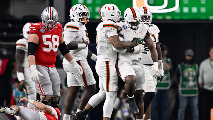 Dec 31, 2025; Arlington, TX, USA; Miami Hurricanes defensive lineman Rueben Bain Jr. (4) celebrates after a sack in the second quarter against the Ohio State Buckeyes during the 2025 Cotton Bowl and quarterfinal game of the College Football Playoff at AT&T Stadium. Mandatory Credit: Jerome Miron-Imagn Images