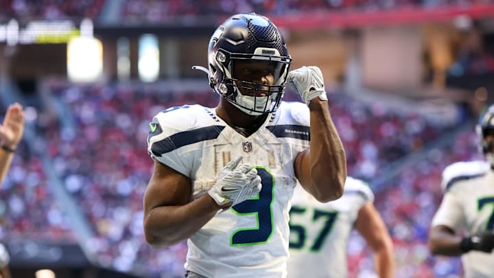 Oct 20, 2024; Atlanta, Georgia, USA; Seattle Seahawks running back Kenneth Walker III (9) celebrates after a touchdown catch against the Atlanta Falcons in the third quarter at Mercedes-Benz Stadium. Mandatory Credit: Brett Davis-Imagn Images
