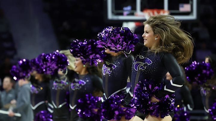 Kansas State Wildcats cheerleader performs during a break